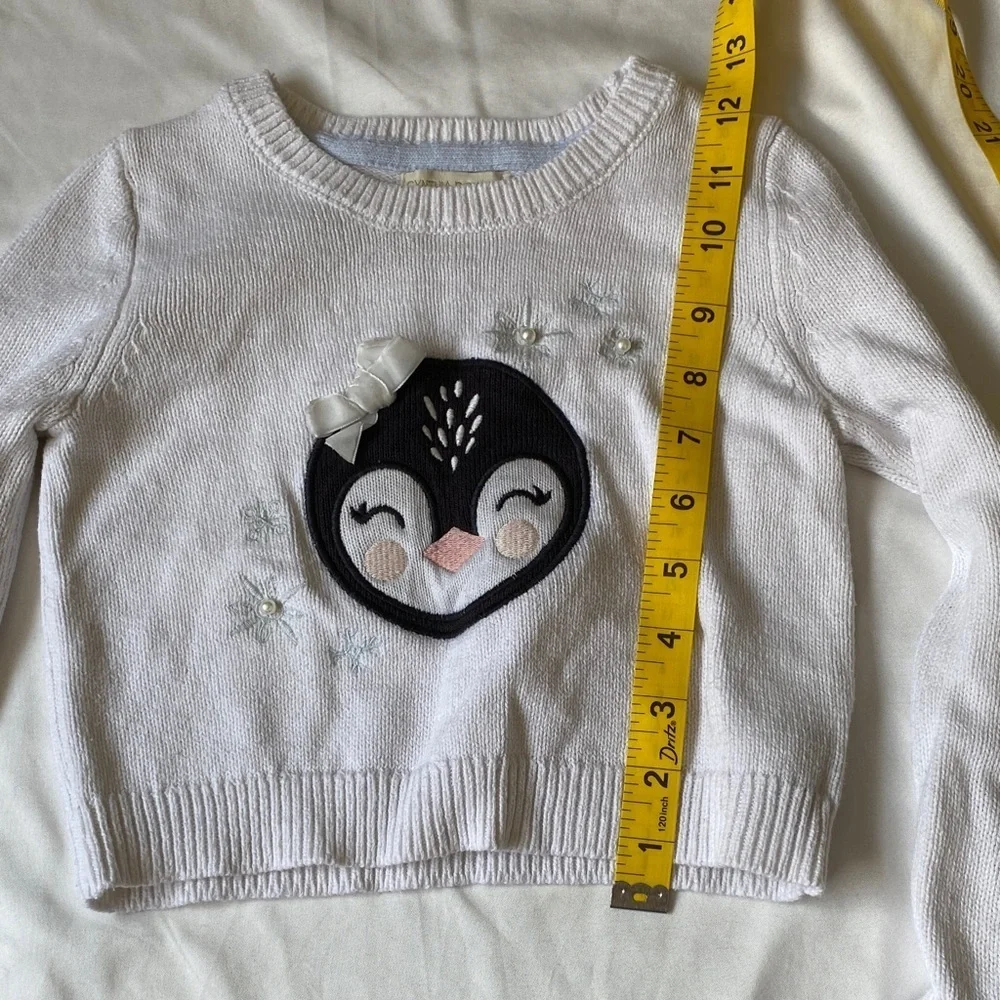 Adorable White Kids Sweater with Penguin Design